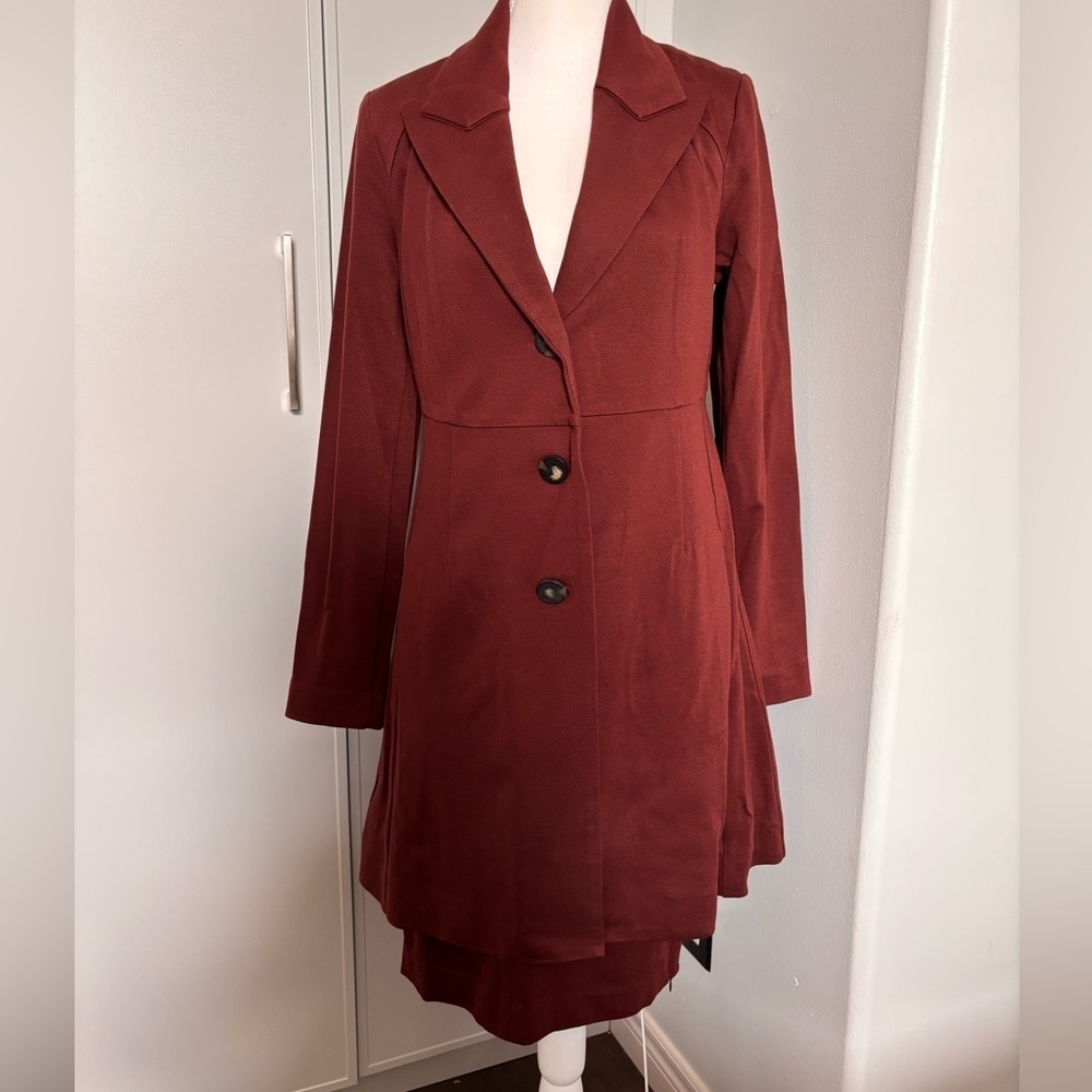 CAbi Two Piece Burgundy Suit with Notched Lapel and Streamlined Silhouette